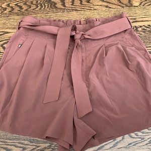 Athleta Skyline Shorts II.   Size 12.  	Cognac Brown.  Used.  Good shape.